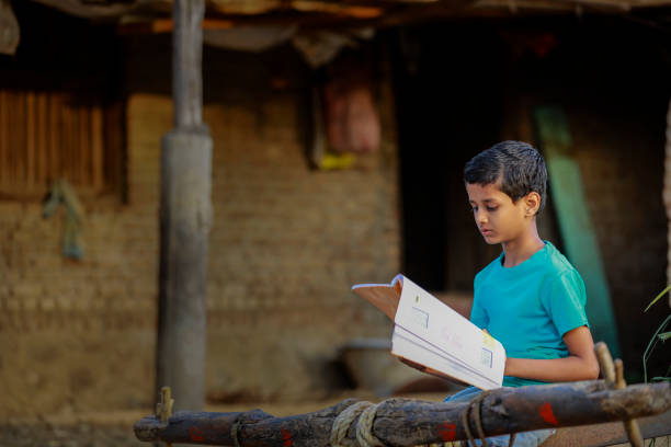 istock Cute indian child studying at home 1316738059
