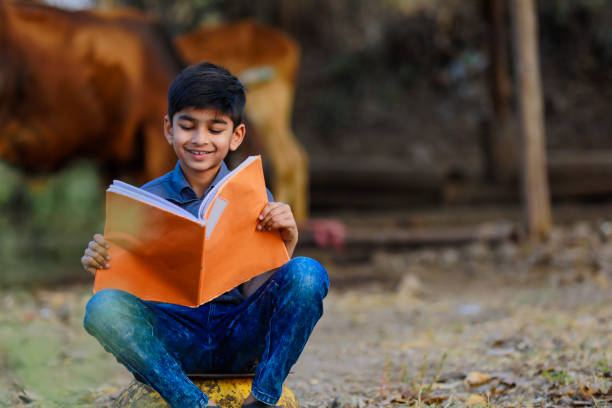 istock Cute indian child studying at home 1316738117