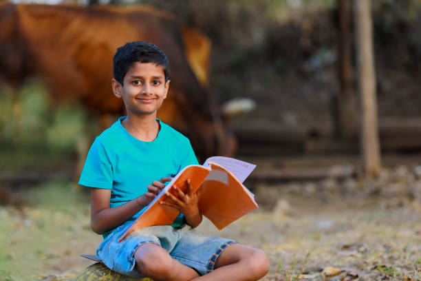 istock Cute indian child studying at home 1316738120