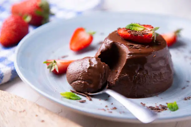 Chocolate pannacotta with strawberries.