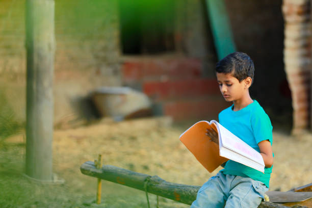 istock Cute indian child studying at home 1316738419