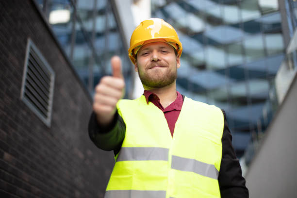 istock Smiling engineer standing on the street. 1316739307
