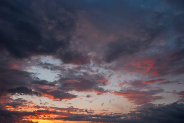 istock Beautiful sunset sky with thunderstorm clouds 1316739434