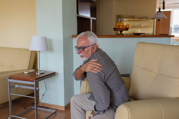 istock An Older Man with Chronic Shoulder Problems and Pain. 1316739797