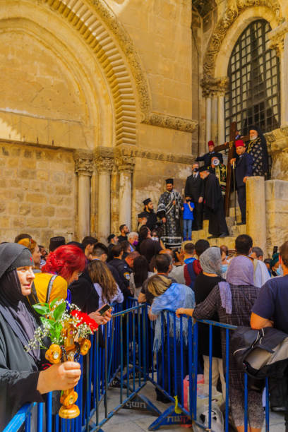 Greek Orthodox Patriarch blessing, Good Friday, Holy Sepulchre church Jerusalem, Israel - April 30, 2021: Crowd attend the Greek Orthodox Patriarch blessing, on Orthodox Good Friday, in the Holy Sepulchre church, Jerusalem Old City, Israel patriarch of jerusalem stock pictures, royalty-free photos & images