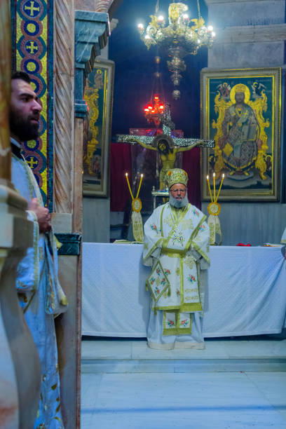 Greek Orthodox Patriarch of Jerusalem, in the Holy Sepulchre church Jerusalem, Israel - May 01, 2021: The party of the Greek Orthodox Patriarch of Jerusalem, on Holy Saturday (Easter), in the Holy Sepulchre church (Catholicon section), Jerusalem, Israel patriarch of jerusalem stock pictures, royalty-free photos & images