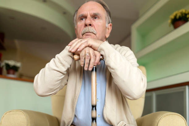 istock An Elderly Man with Physical Disabilities is Looking Worried and Lonely. 1316743191