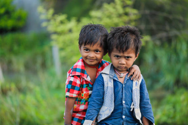 istock indian poor child playing at home 1316743986