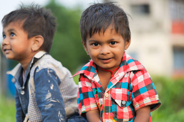 istock indian poor child playing at home 1316744046