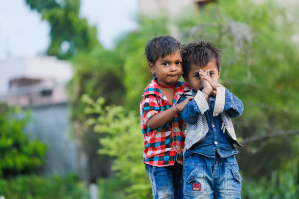 istock indian poor child playing at home 1316744093