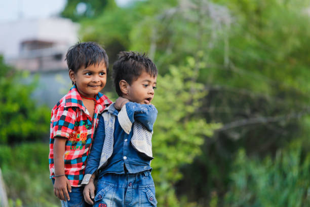 istock indian poor child playing at home 1316744107