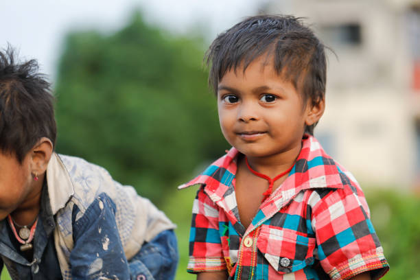 indian poor child playing at home