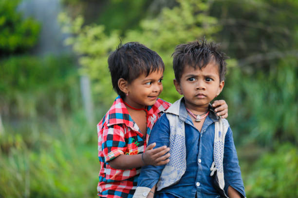 istock indian poor child playing at home 1316744131