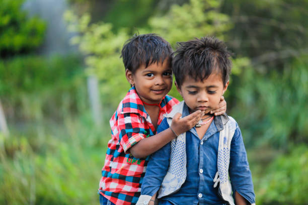 istock indian poor child playing at home 1316744147