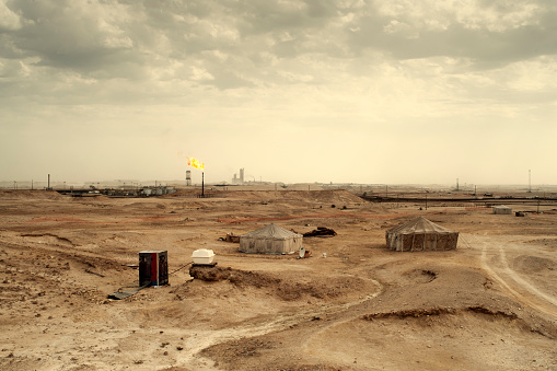 Oil and Gas production field in the desert in Bahrain.