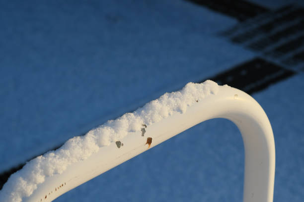 istock White snow on the barricade 1316746587