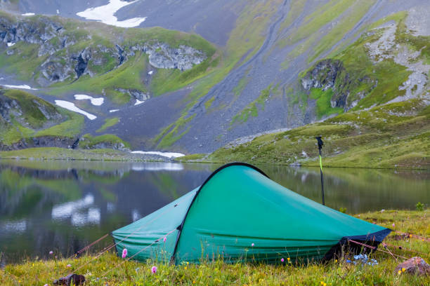 istock touristic tent near a mountain lake 1316748619