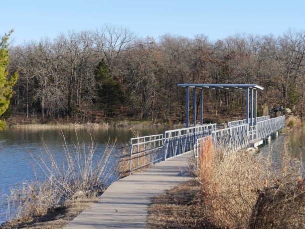 concrete bridge with railings at lake murray state park. - lake murray imagens e fotografias de stock