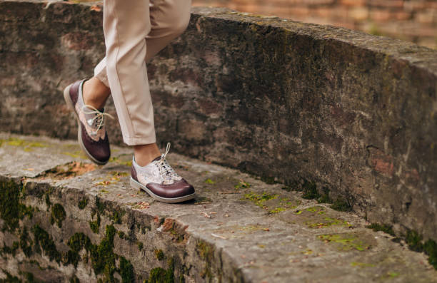 istock Woman walking in modern shoes 1316752919