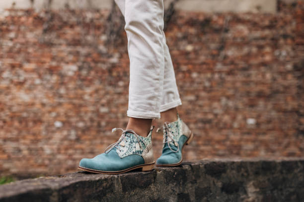 istock Woman wearing modern shoes 1316752927
