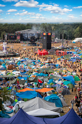 Kostrzyn Nad Odra, Poland - August 02, 2019:Thousands young people walking through the huge campground with hundreds of tents at 25th Pol'and'rock Festival - the biggest open air ticket free rock music festival in Europe