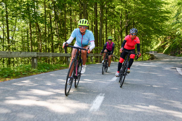 istock Female friends cycling 1316757626