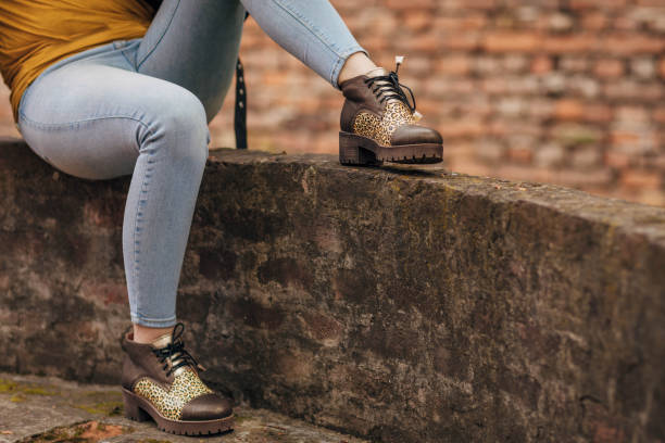 istock Modern woman sitting outdoors 1316758833