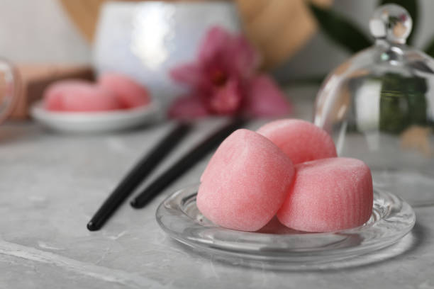 istock Delicious mochi on grey table, space for text. Traditional Japanese dessert 1316759047
