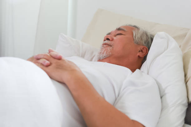 istock Asian Elderly man sleep and sweet dream on bed. 1316759970