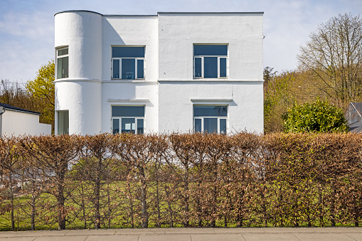 Villa at Strandvejen - a road north of Copenhagen where the most expensive homes in Denmark are situated with a view over the Sound in Danish Øresund. The picture is taken in a suburb called Skodsborg