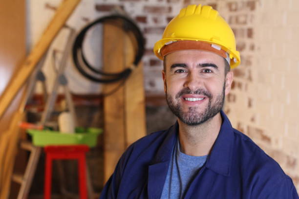 istock Worker with yellow helmet and uniform on site 1316763012