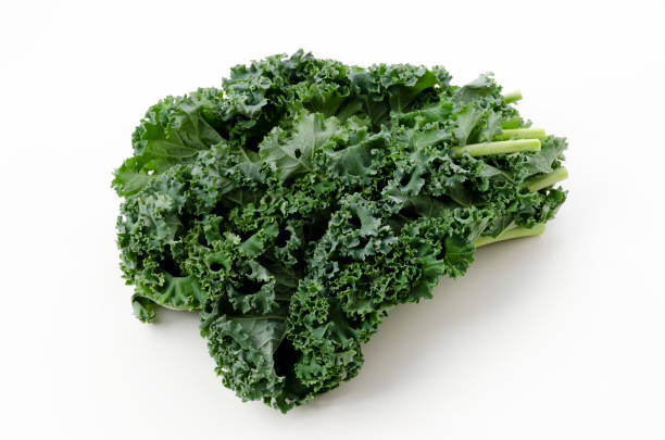 istock Fresh Curly green kale on white background 1316768685