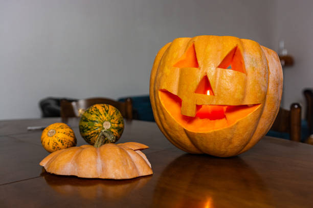 istock Carved pumpkins placed on the table 1316768807