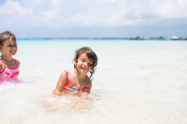 istock Children playing at the beach 1316768882