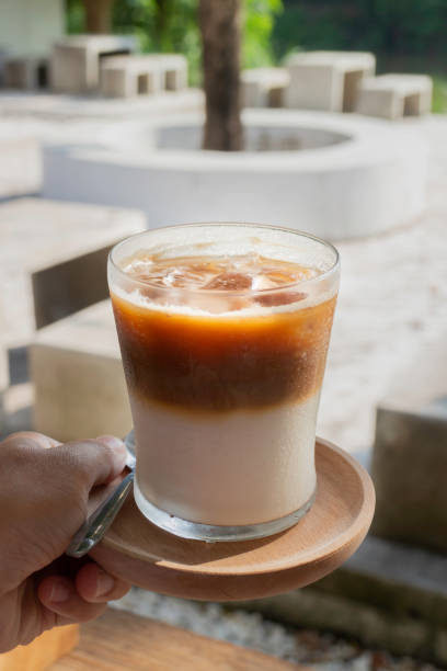 istock Morning coffee latte on wood desk work from home office 1316769135