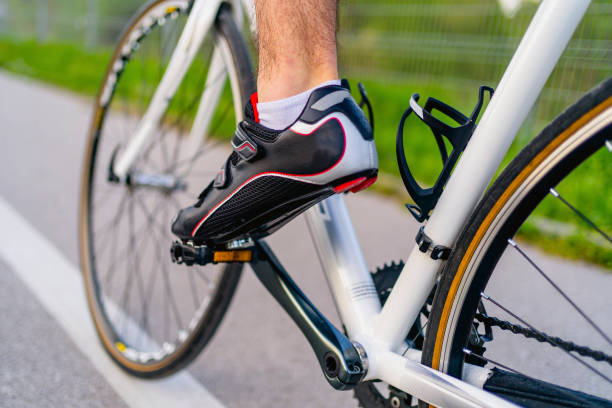 istock Cyclist foot on bicycle pedal 1316774288