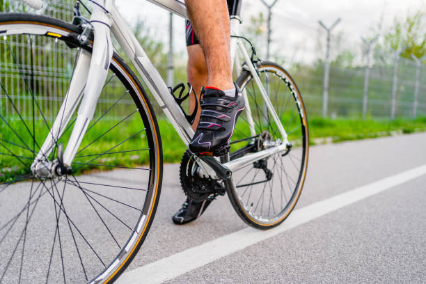 istock Cyclist feet on bicycle pedal 1316775890