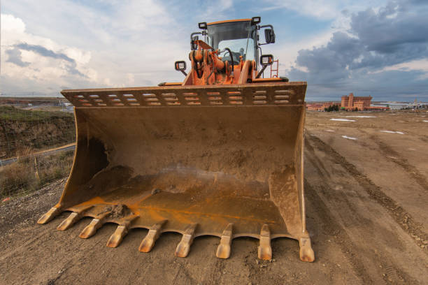 istock Excavator building a road in a site construction 1316778115