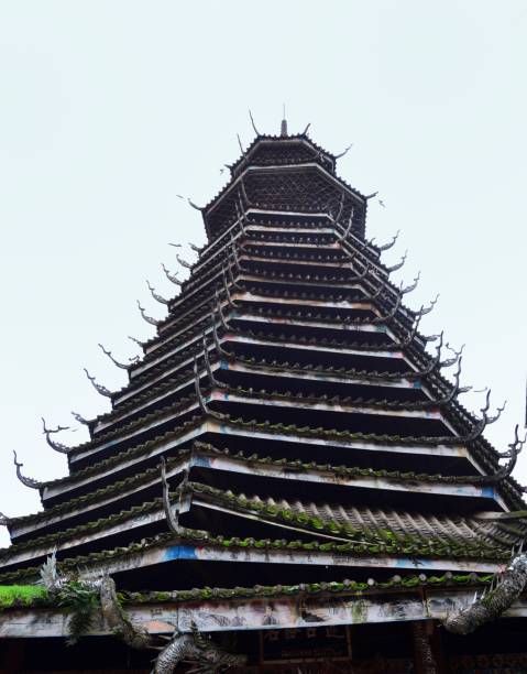 Drum Tower of "Gaozeng" Dong Village in Guizhou Province,China Guizhou Province,China,
Qiandongnan Miao and Dong Autonomous Prefecture, Kaili City, Congjiang County,
The Gulou is a characterized building in Dong, compared with local-style dwelling houses of Dong, it is towering in Dong village, stand head.
Drum buildings are Dong nationality's peculiar buildings with high value of building science.
This is the Drum Tower of "Gaozeng" Dong Village. qiandongnan miao and dong autonomous prefecture stock pictures, royalty-free photos & images