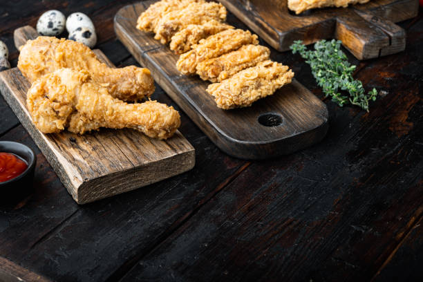 istock Southern fried chicken on dark wooden background, with space for text 1316781556