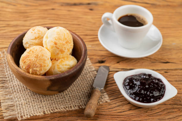 istock Typical brazilian cheese bun in a basket, coffee and jam 1316784728