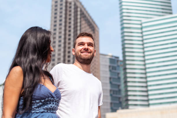 istock Happy couple walking in town 1316788828