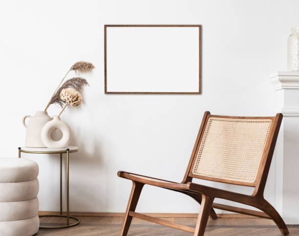 istock Blank picture frame mock-up on a white wall. Artwork in interior design 1316789015