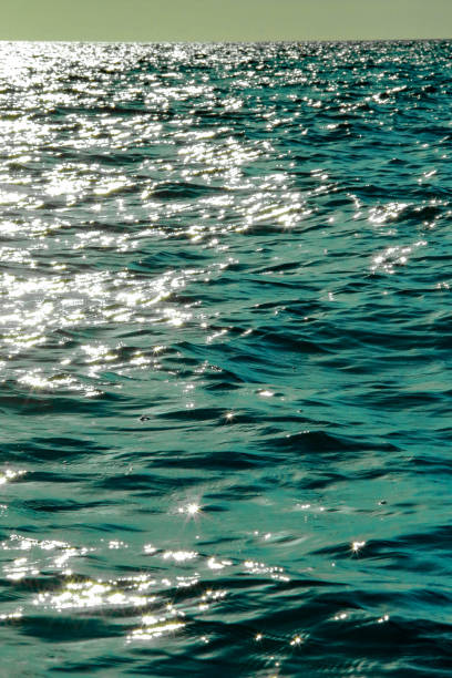 istock ripple and the reflection of sunlight ocean 1316789638