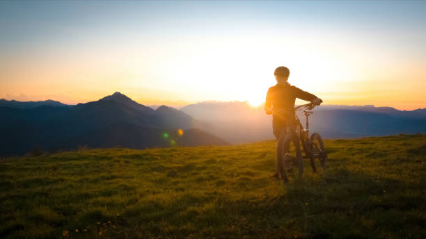 istock Walking uphill with mountain bike 1316795205