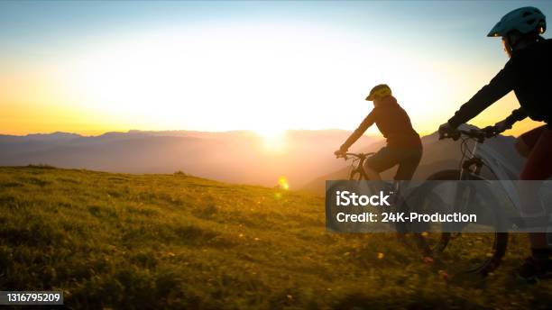 Cycling Uphill With Mountain Bike Stock Photo - Download Image Now - Family, Mountain, Mountain Biking