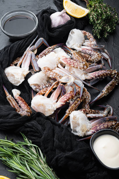 istock Fresh blue swimming crab meat, on black background 1316799131