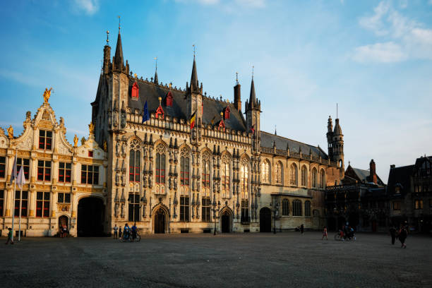 istock Large market square in Bruges, Belgium on sunset 1316799462