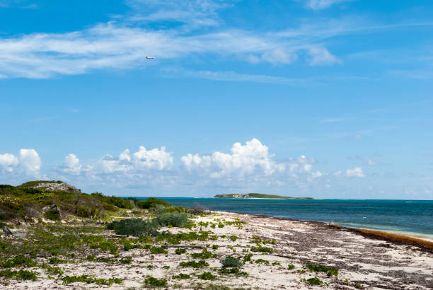 istock Airplane Leaving Grand Turk Island 1316800308