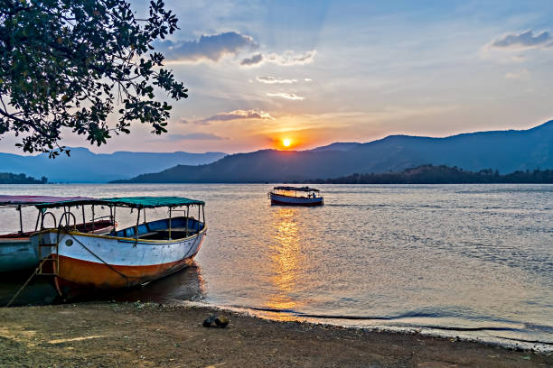 istock A small boat and sunset at Koyana river backwater at Bamnoli in Satara district of Maharashtra, India. 1316804036